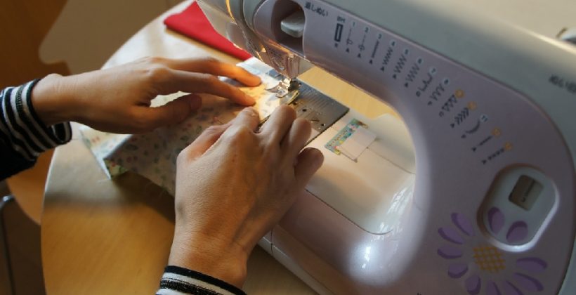 Sewing machine features - image shows a person sewing