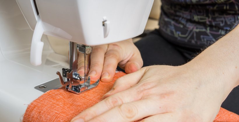 beginners sewing day - a student learn how to use a sewing machine