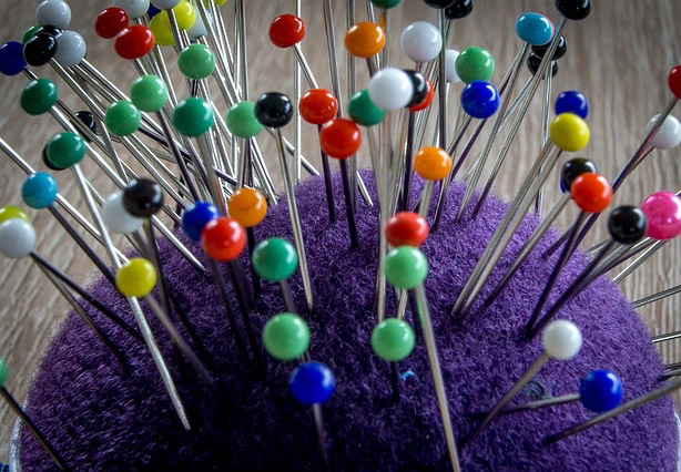 Sewing Classes Textile Art workshops - image of a pin cushion full of colourful pins