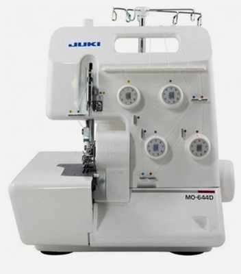 A Juki MO-644D Overlocker. It is white in colour, has 4 tension dials on the front.
