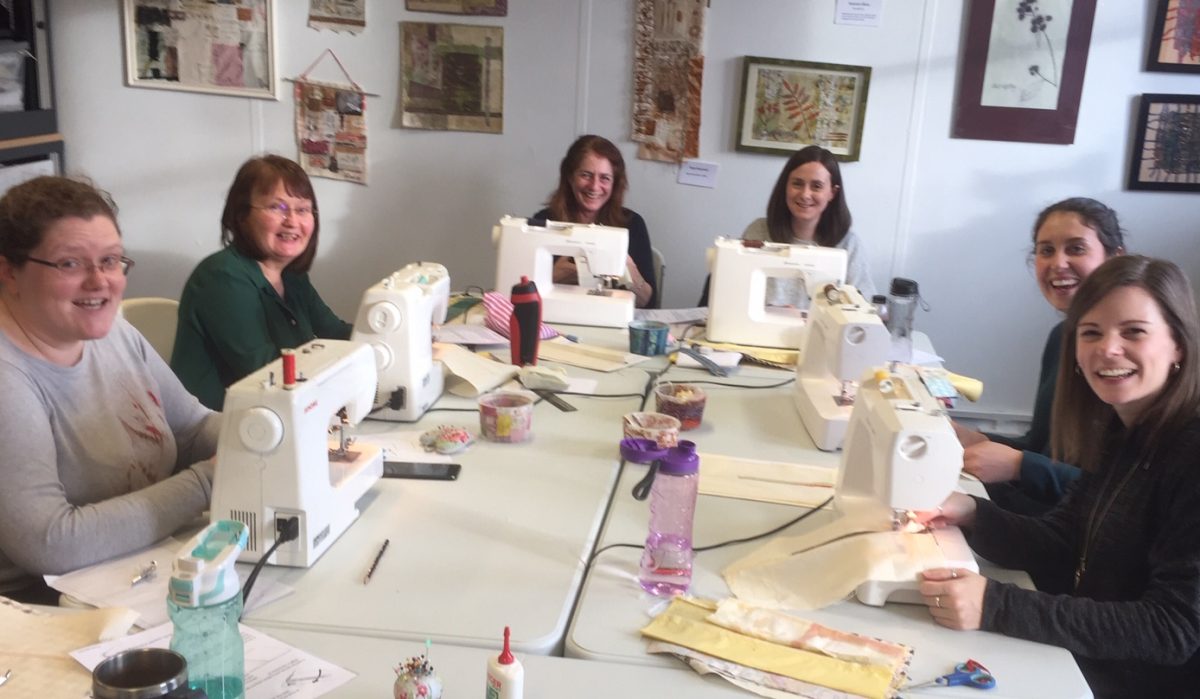 Beginners Sewing Course XL. Summer Schools a- group of happy sewing students