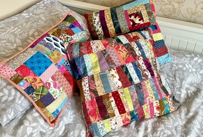 scrappy patchwork cushion - colourful scatter cushions made with fabric scraps