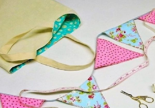 Kids sewing Bunting (800 x 420) Bunting - kids sewing class to make a line of bunting in pink polka and floral patterns